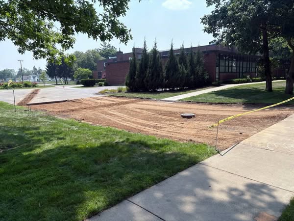 July 12 2025 - driveway east of former St. Henry building - June 10